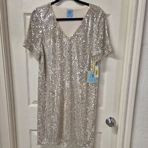 CeCe Cream and Black Garment